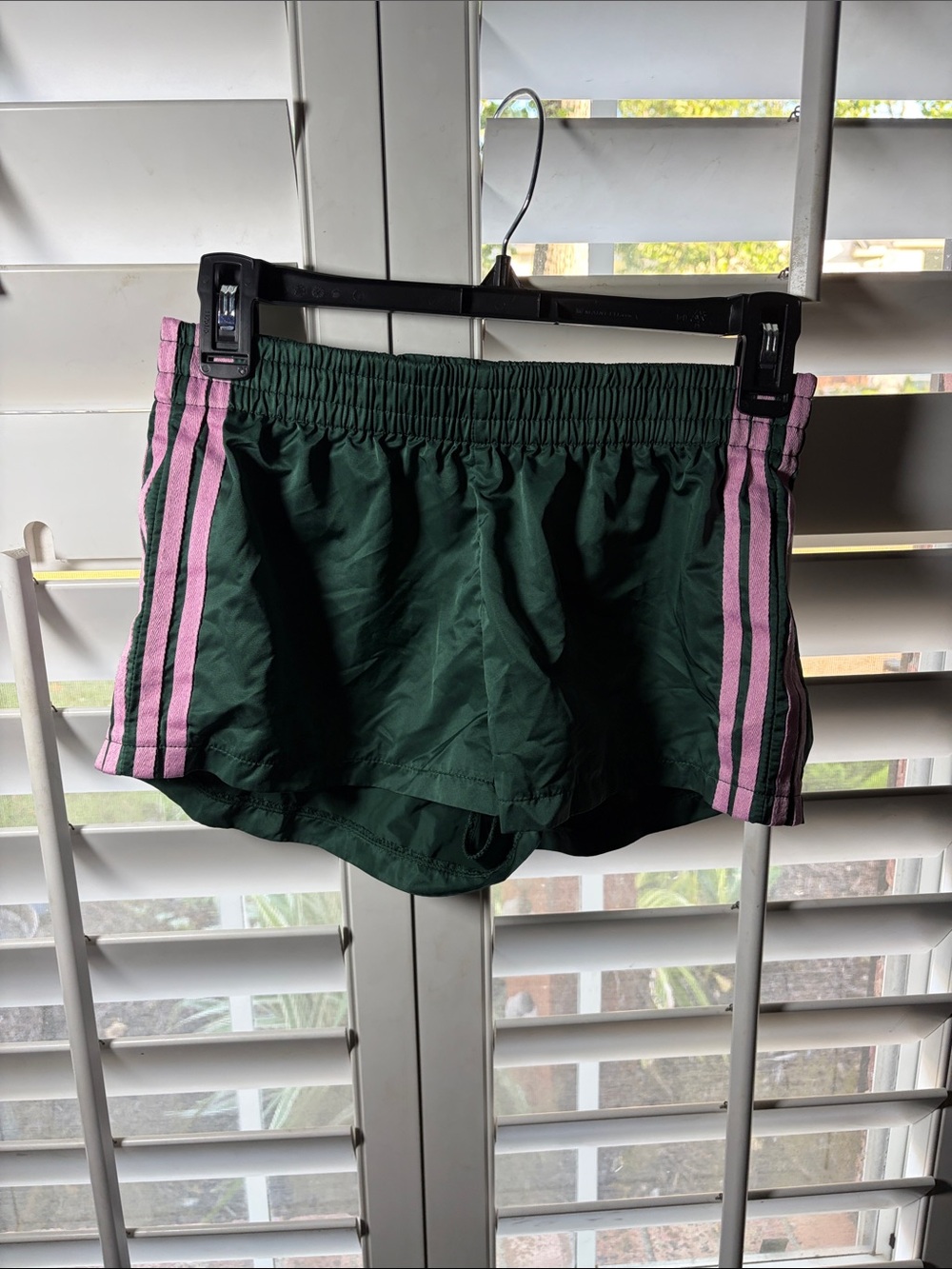 Edikted Dark Green Athletic Shorts with Pink Side Stripes